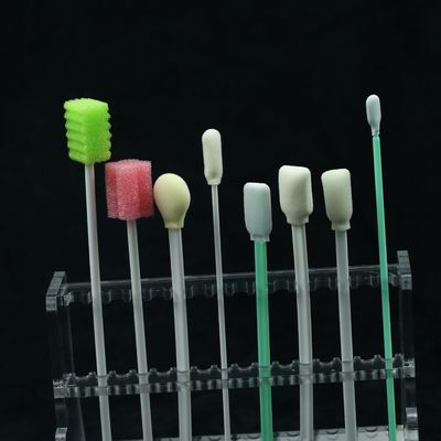 Dentes descartáveis dos acessórios dentais que limpam cotonetes
